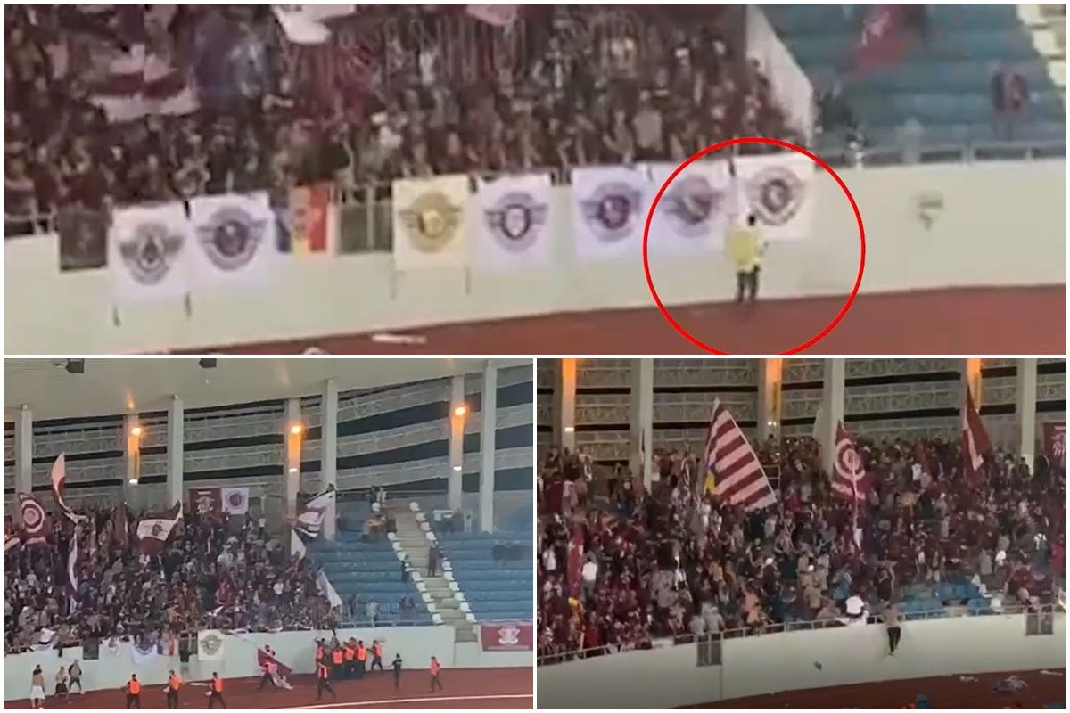 Imagini halucinante: un steward angajat să asigure paza pe stadion încearcă să fure un steag de gard al Rapidului! De aici a plecat toată nebunia la meciul cu FC U Craiova | VIDEO