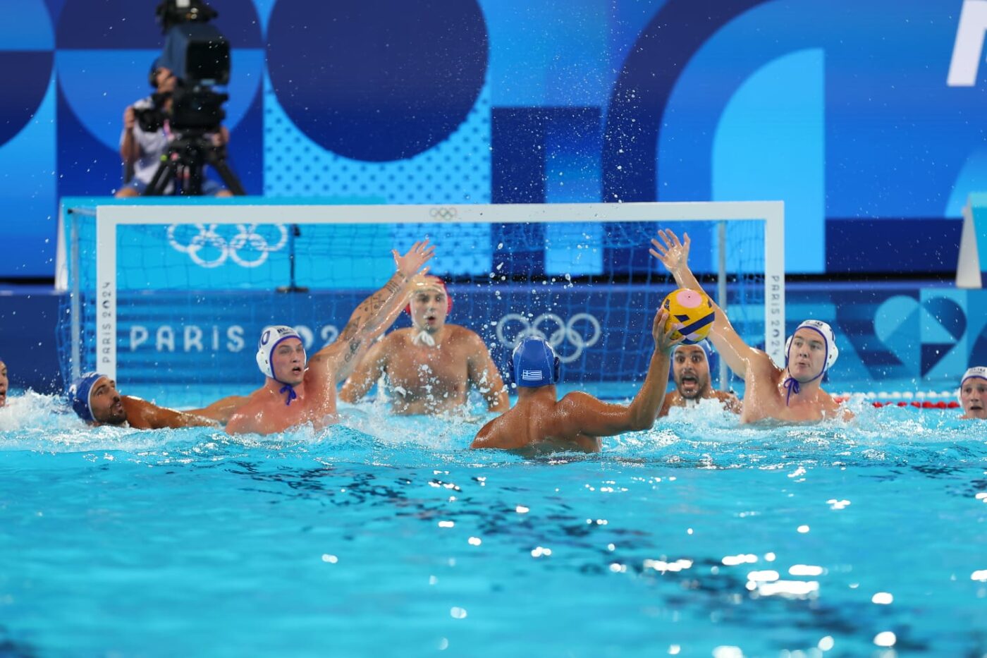 S-a cântat imnul României pentru prima dată la Jocurile Olimpice de la Paris! România a pierdut categoric cu vicecampioana olimpică, Grecia, la polo pe apă. GALERIE FOTO